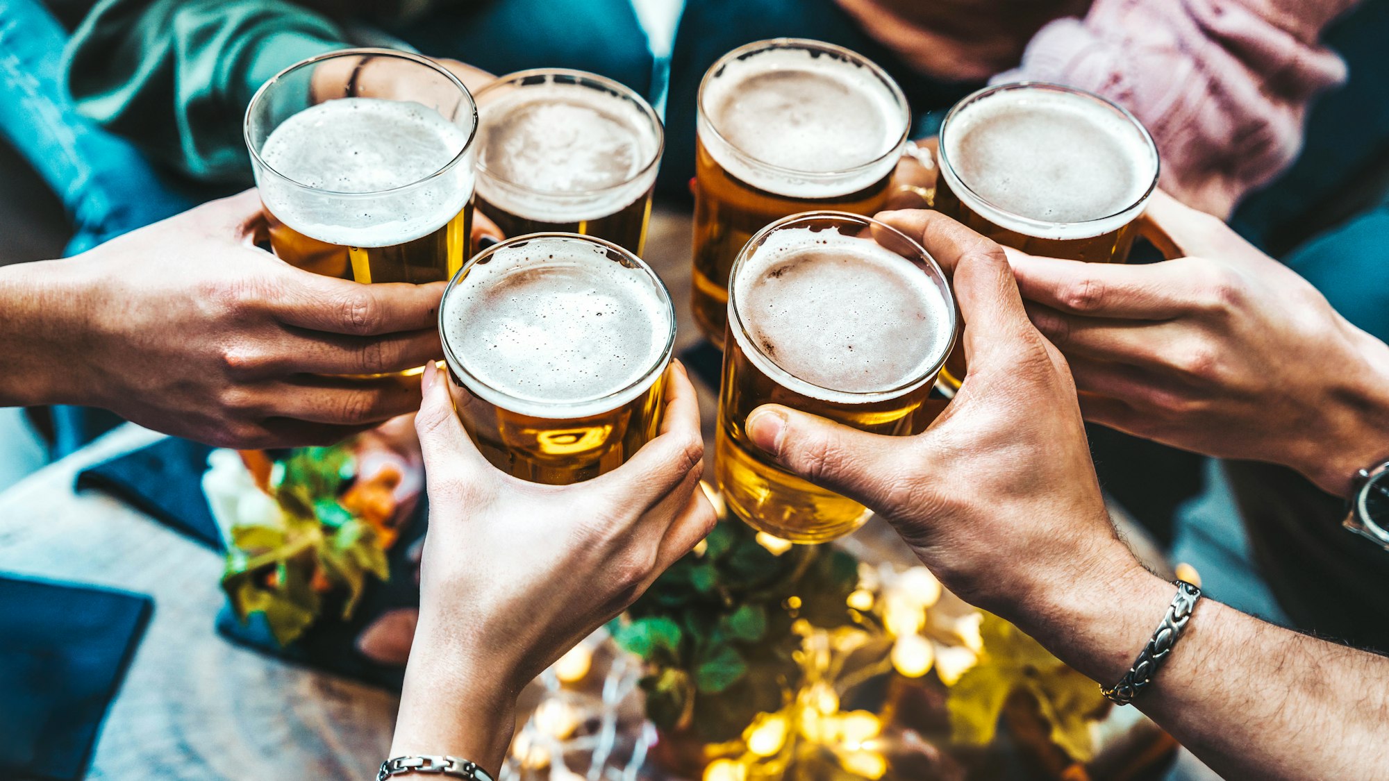 Group of people drinking beer at brewery pub restaurant